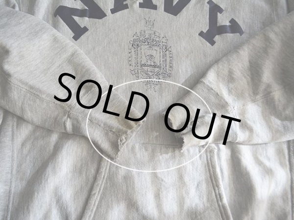 両袖リブにダメージ汚れ。